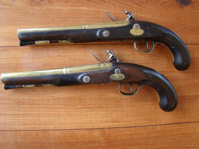 A pair of English flintlock brass barreled coaching pistols by John Bennett circa 1790 — image 2